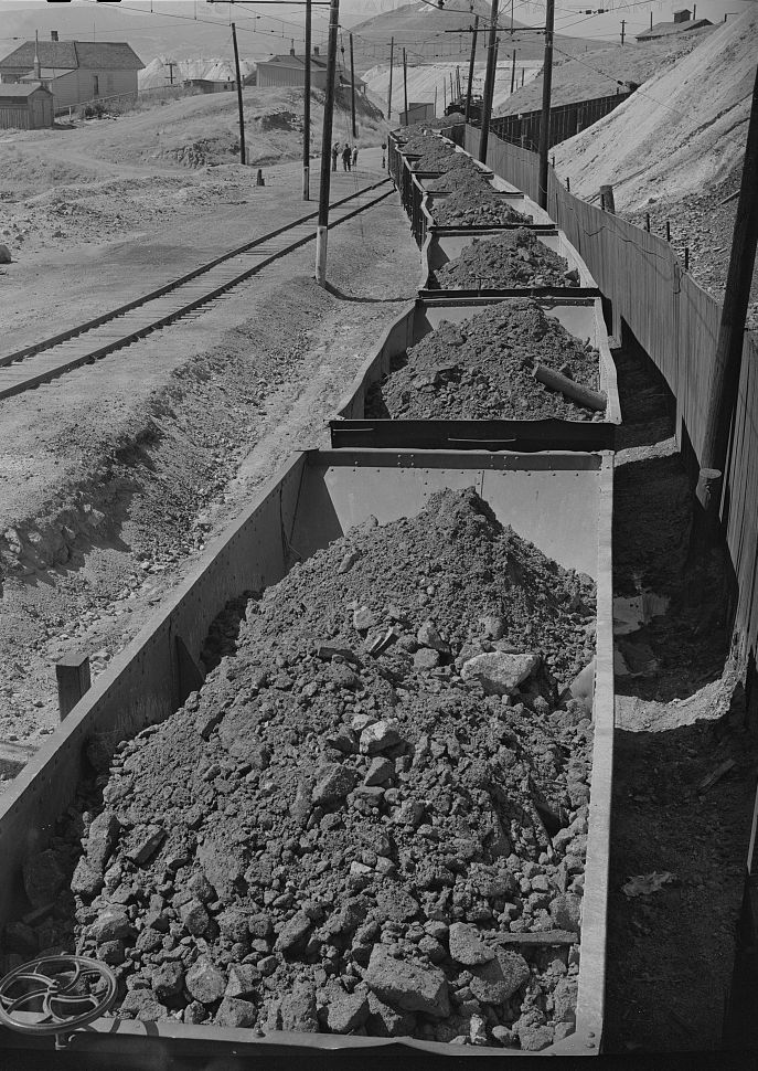 Rail cars loaded with copper ore leaving a Butte mine, 1942